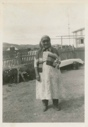Image of Elderly Eskimo [Inuk] woman wearing sunglasses